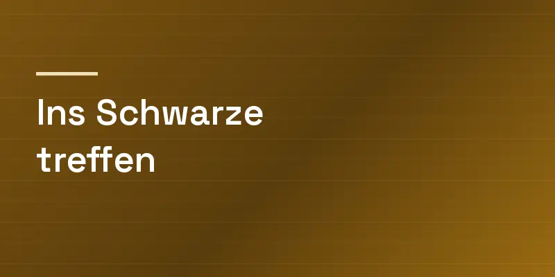 Kartenmotiv mit der Redewendung Ins Schwarze treffen